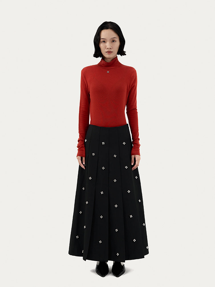 PLEATED SKIRT WITH BEADED EMBELLISHMENTS