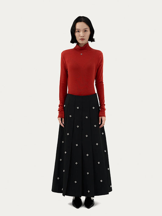 PLEATED SKIRT WITH BEADED EMBELLISHMENTS