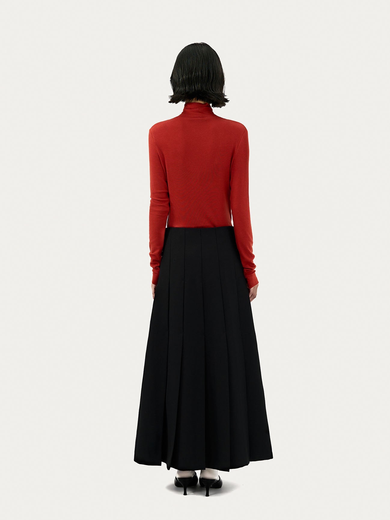 PLEATED SKIRT WITH BEADED EMBELLISHMENTS